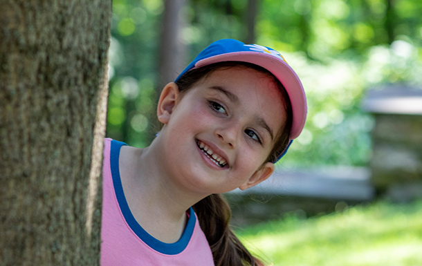 girl beside a tree