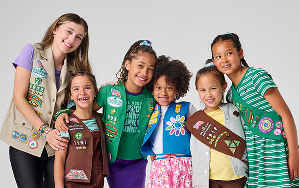 girl scouts in uniforms
